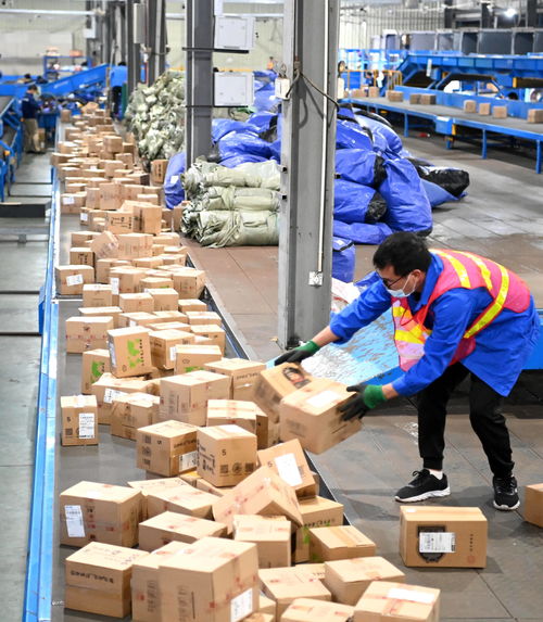 我国快递年业务量首次突破700亿件